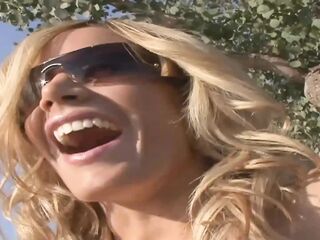 Lesbo harlots take on a large pink sex toy