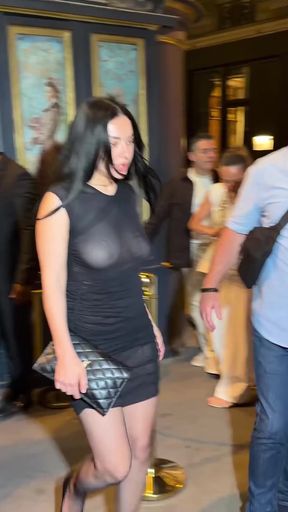 Curvy British celeb shows off her tits in see-through outfit