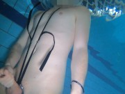 Naked swim and cum with metal cockring and plug