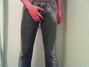 Boy pissing his pants and jerking off