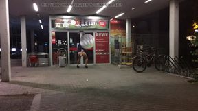 Crossdresser plays with dildo in public