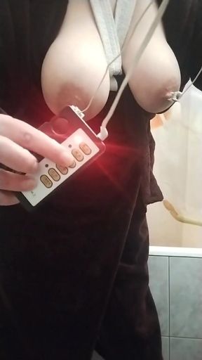 Captivating moment from &quot;A fat bitch caresses her nipples with electric shocks.&quot;