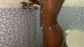 Hot Petite Ebony Babe Enjoys Solo Moment in the Bathroom Caressing Her Small Boobs