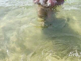 pissing and masturbating underwater at the sea public beach