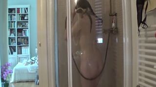 spying on my horny stepsister when she showers