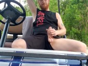 Hairy ginger showing off dick outdoors on golf cart