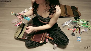 Organizing Travel Bags in Sports Bra and Windbreaker Pants