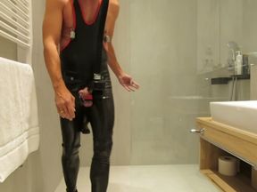 Pierced and Masked Rubber Gimp in Buffallos yerk off