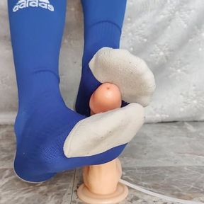 Sockjob with blue Adidas soccer socks