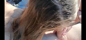 stepdaughter blows stepfather on a nudist beach