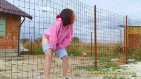 Desperate hipster girl trying hard to pee