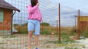 Desperate hipster girl trying hard to pee