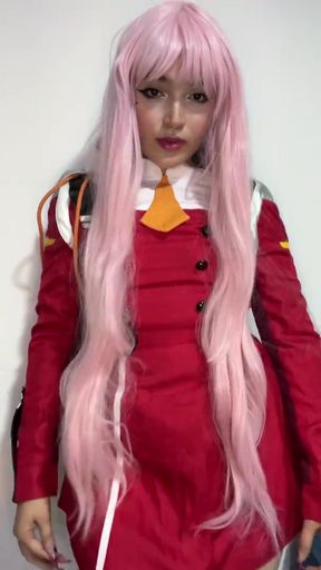 Red-haired cosplay anime girl poses in a professional photo shoot