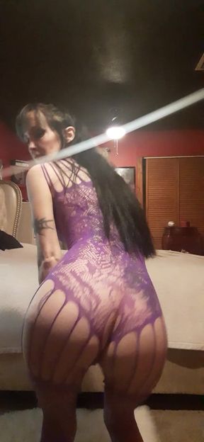 Stripping in a Purple Fishnet Crotchles
