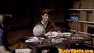 Nerdy college students blow each other in the library