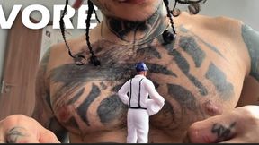 Little man visits alien planet of a giant with black eyes and a forked tongue