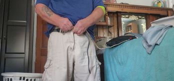 Fat boy stroking a little