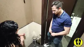 Curvy Latina gives naughty public blowjob in the toilet stall