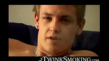 Bad stud Tomy chainsmoke his red cig while jerking on the couch