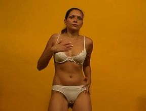 Dark-haired slut loves to strip and masturbate
