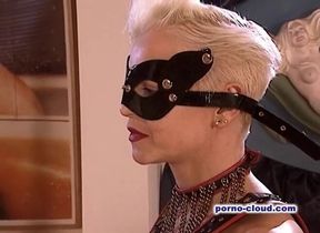 The masked slave in the fantastic latex orgy
