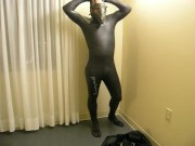 Completing the transformation as I change into orca predator wetsuit