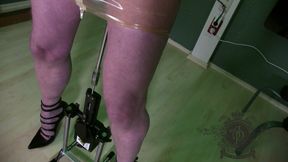 Dominatrix works the latex slave hard with the fucking machine