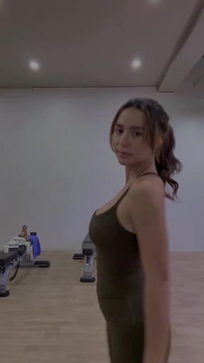 Filipina celebrity babe shows off her athletic body in a standing pose