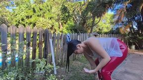 Washing my hair outdoors in shiny red leggings