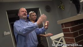 Old lady with large breasts gives blowjob on floor like a tease