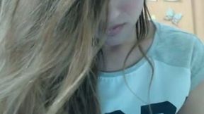 Sexy and charming light haired babe and her awesome masturbation show