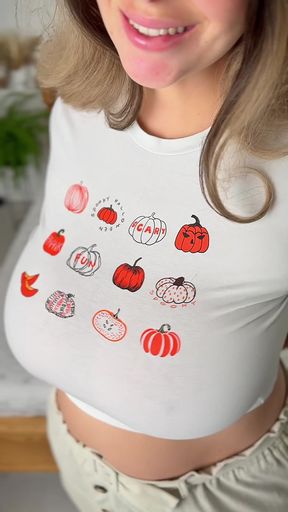 Large breasts and a pumpkin-patterned blouse