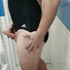 Tranny wearing adidas one piece swimsuit