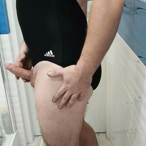 Tranny wearing adidas one piece swimsuit