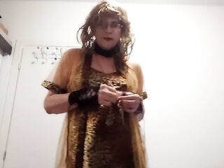 Transsexual MILF shows off and performs striptease in her recent lingerie and spruce sandals