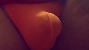 playing with my bulge in a orange spandix thong