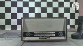 Old historical Radio under heeled Boots