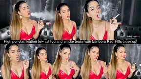 High ponytail, leather low cut top and smoke tease with Marlboro Red 100s close up!