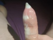 Cum and piss in a condom