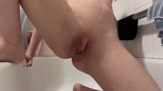 Trans man pissing in the bath for the first time