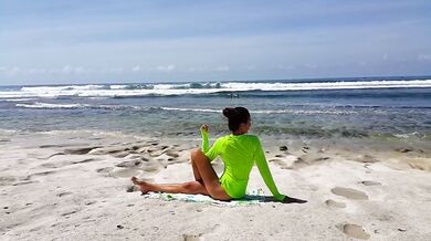 Naked YOGA # Morning Yoga exercises at Ocean Shore