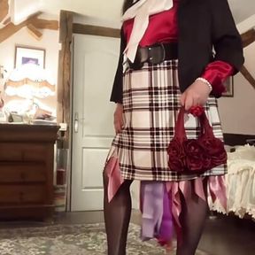 In secretary-style outfit with a short plaid skirt for a night out