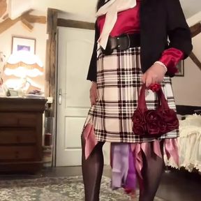 In secretary-style outfit with a short plaid skirt for a night out