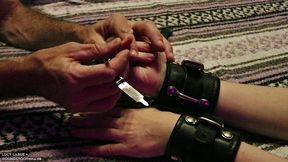 thick black leather cuff bondage bdsm fingernail clipping