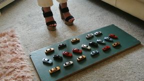 GIANTESS Charn crushes 20 tiny toy cars in chunky high heels high left view feet foot toy car crush