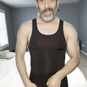 Caught flexing in a wrestling singlet, when my husband walks in, and I take his cock my way