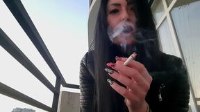 Smoking fetish from sexy Dominatrix Nika. Pretty woman blows cigarette smoke in your face