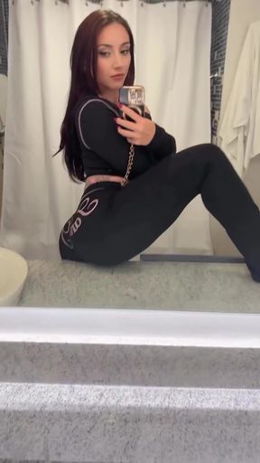 Clothed Mandy Muse sits alone and lonely, her curvy figure concealed