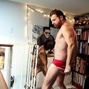 hairyartist in speedos with a huge bulge