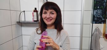 Brunette Toys Herself with Huge Dildo